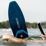 Close-up of the Connelly Big Daddy ski floating on the water, highlighting the sleek blue and black design.