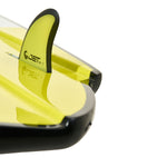 Close-up of yellow fin on Jet wakesurf board showing curved fin base and tail detail.