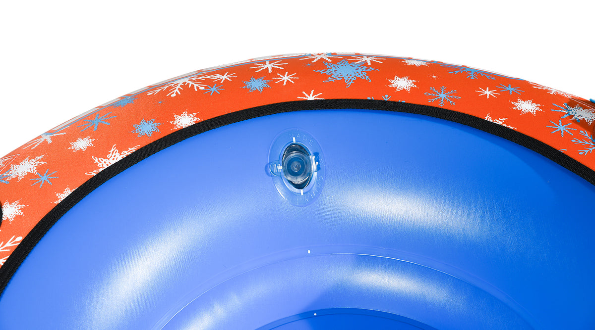 Close-up view of Avalanche Snow Tube air valve on blue inner seat.