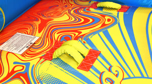 Detail of Super Fun 2 seating area with yellow handles and swirl pattern graphics.