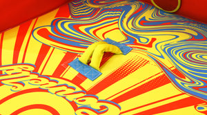 Close-up of Super Fun 3 padded handle on colorful swirl design surface.