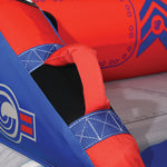 Close-up of Switch 3 side showing red and blue padded armrest with logo.