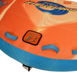 Close-up of blue grab handles and Fill ‘Er Up valve patch on orange and blue deck surface.