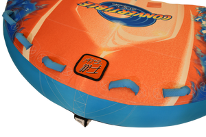 Close-up of blue grab handles and Fill ‘Er Up valve patch on orange and blue deck surface.