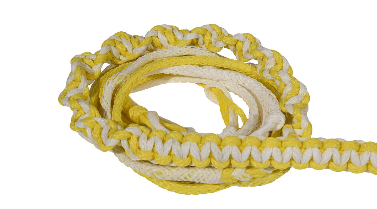 Close-up of coiled yellow and white Poly-E Rope showing braided pattern and smooth texture.