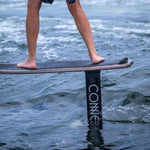 Close-up of a person riding the Pilot Foilboard in the water.