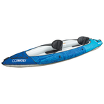 Angled left side view of the Nautic 11.5 kayak in blue, displaying seats, bungee storage, and a sleek hull.