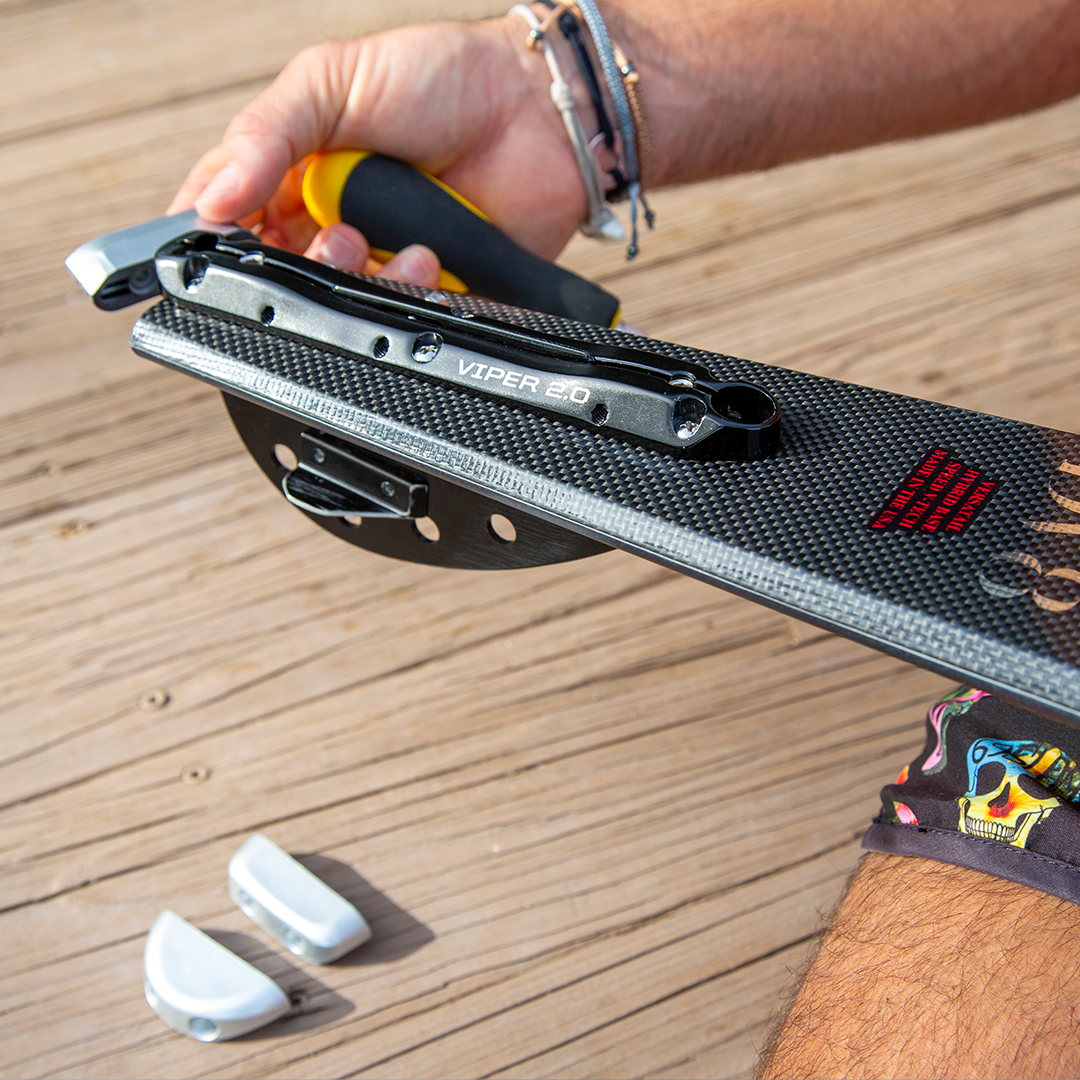Angled view of the 2021 DV8 waterski showing its tapered edges, carbon fiber construction, and performance-driven design.