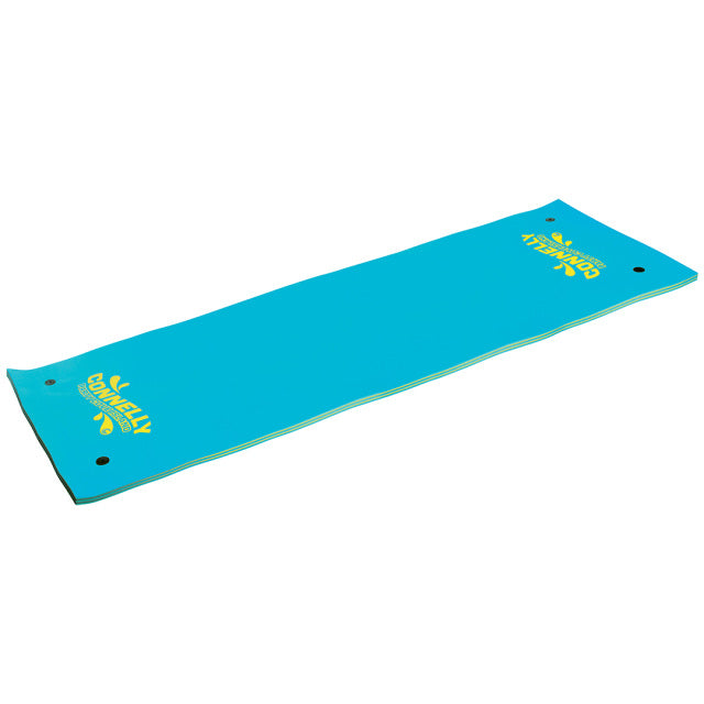 Side view of the 18'x6' Party Cove Island Deluxe, showcasing its blue foam surface, yellow branding, and reinforced edges.