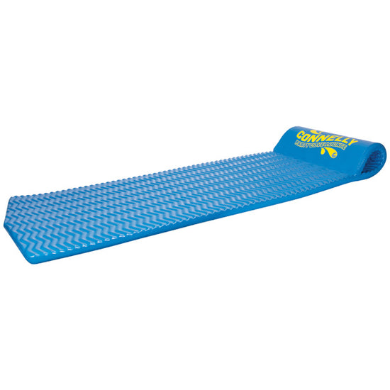 Angled product view of the Party Cove Lounge, a blue floating foam mat with a textured surface and built-in headrest.