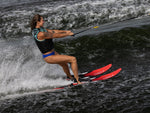 Experience the thrill of waterskiing in 2024 Voyage blue shorts and life jacket with step base tech.