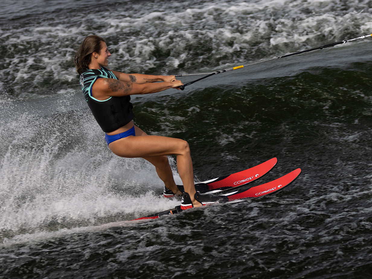 Experience the thrill of waterskiing in 2024 Voyage blue shorts and life jacket with step base tech.